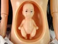 Miniatyrbild 4 av 5: Pregnant Baby Doll In White Dress
