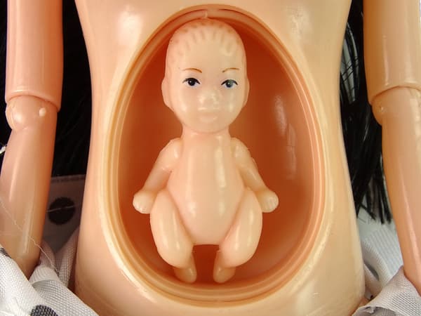 Pregnant Baby Doll In White Dress