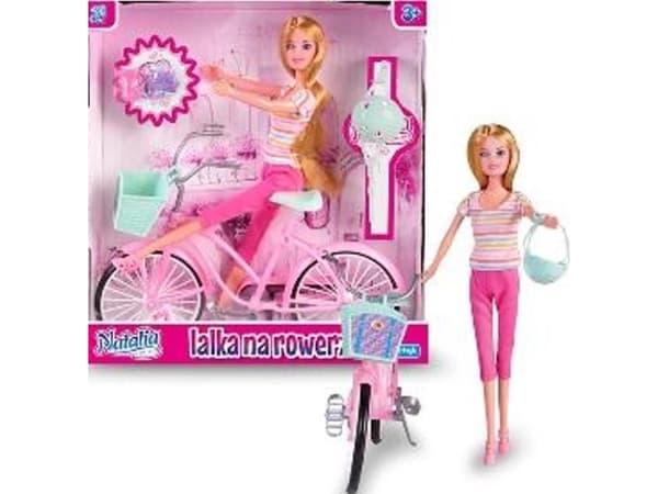 The artist Natalia doll on a bicycle