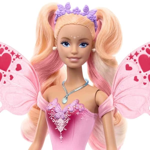 Barbie-flicka med vingar och kläder med färgförändring