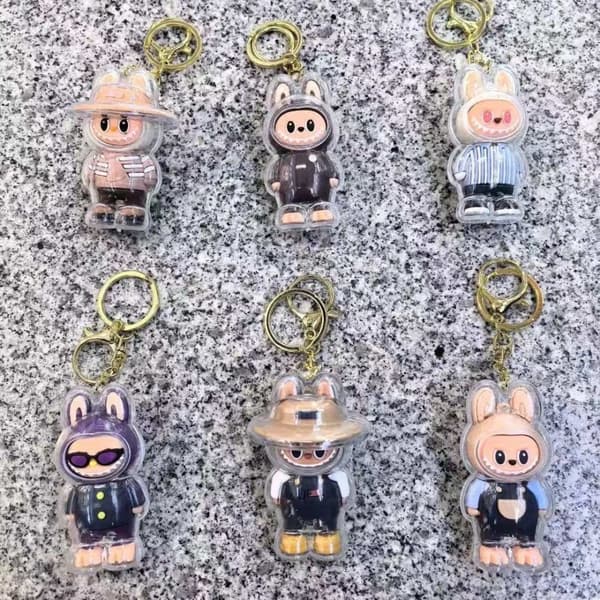 Ny Labubu Nyckelring Blind Box Leksaker Ryggsäckshänge med skyddsfodral Blind Box Hot Kawaii Cartoon Bag Mystery Box Barnleksaker