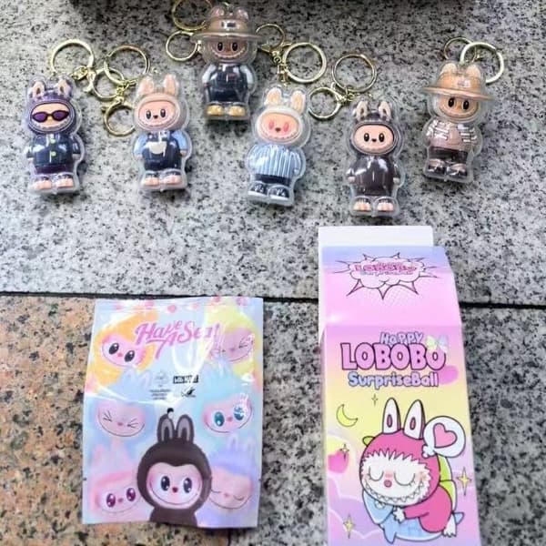 Ny Labubu Nyckelring Blind Box Leksaker Ryggsäckshänge med skyddsfodral Blind Box Hot Kawaii Cartoon Bag Mystery Box Barnleksaker