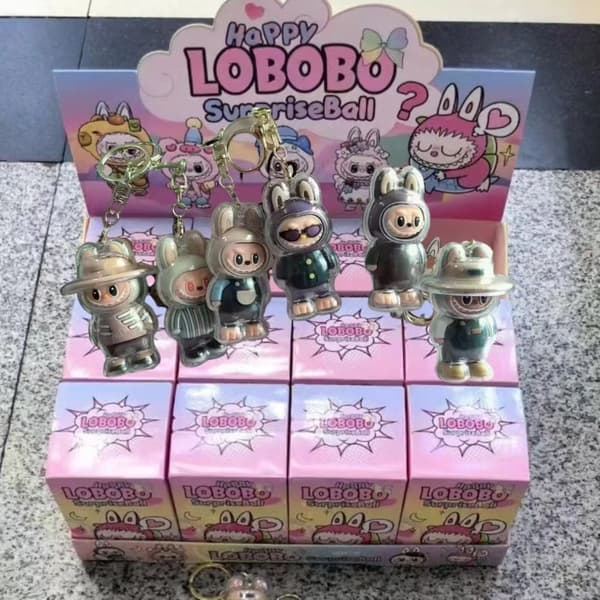 Ny Labubu Nyckelring Blind Box Leksaker Ryggsäckshänge med skyddsfodral Blind Box Hot Kawaii Cartoon Bag Mystery Box Barnleksaker