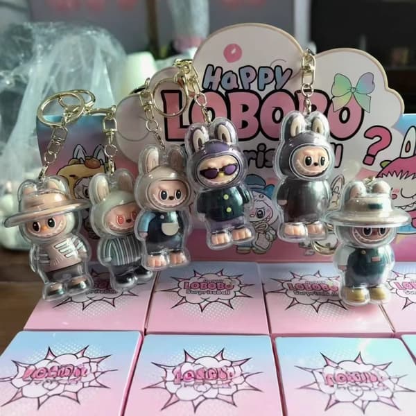 Ny Labubu Nyckelring Blind Box Leksaker Ryggsäckshänge med skyddsfodral Blind Box Hot Kawaii Cartoon Bag Mystery Box Barnleksaker Random 1pc
