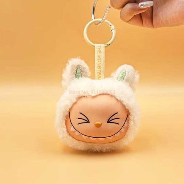 Ny Labubu Blind Box Vinyl Plysch Huvud Nyckelring Hänge Söt Monster Plysch Doll Bag Mode Hänge Födelsedagspresent Modell Barnleksak