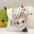 Miniatyrbillede 10 af 11: Lisa Same Labubu Lærredstaske Kvinde Sød tegneserie Shopping Håndtaske Casual Student Skuldertaske The Monsters Crossbody Tasker