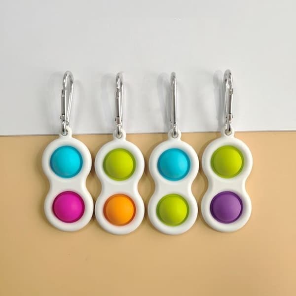 fidget toys Simple Dimple Pop It Fidget Toy med nyckelring- Slumpmässig färg 5-pack