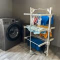 Miniatyrbillede 6 af 11: El-opvarmet tørrestativ 21m Tørreflade 15 kg Kapacitet 50-55 °C 220 W Indendørs Sammenklappelig Energieffektiv Hurtigtørrende Støvdæksel 6 tøjklemmer