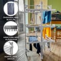 Miniatyrbillede 1 af 11: El-opvarmet tørrestativ 21m Tørreflade 15 kg Kapacitet 50-55 °C 220 W Indendørs Sammenklappelig Energieffektiv Hurtigtørrende Støvdæksel 6 tøjklemmer