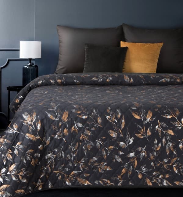 BLINK dekorativ filt 170x210 svart guld quiltat botaniskt tryck
