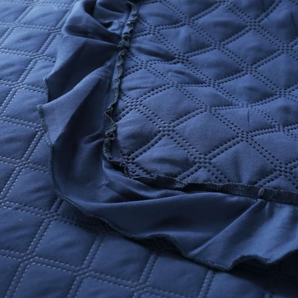 RUFFY dekorativt sengetæppe 160x220 quiltet med en flæse marineblå