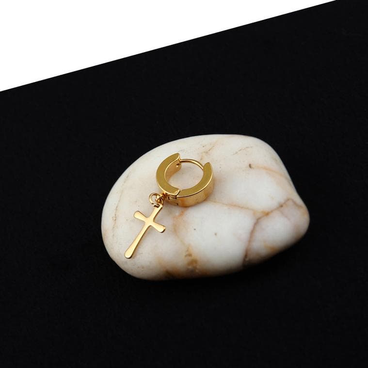 Ett örhänge med symboler hexagon kors för män guld silver svart