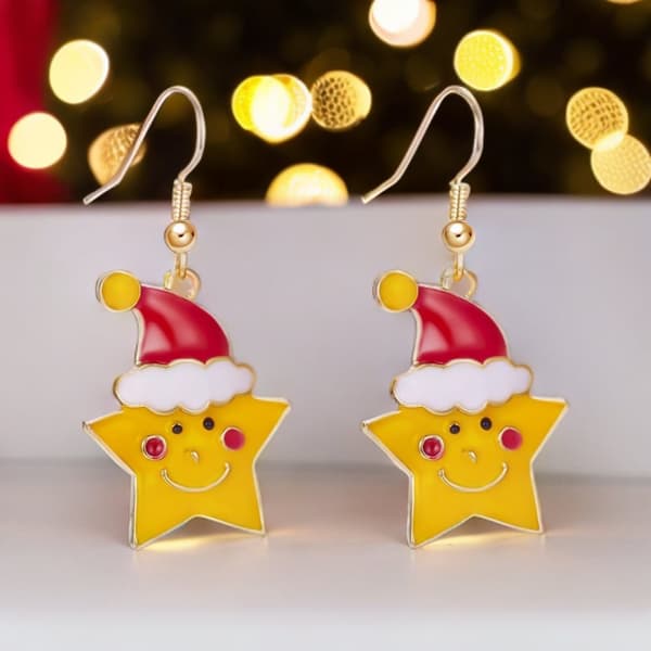 Snygga örhängen stjärna med röd tomteluva jul advent