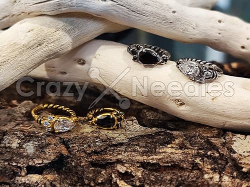 Guld klickerringörhänge med svarta zirkoner - K-012 1.2/10