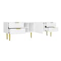 Miniatyrbild 6 av 11: TV-bänk med strukturerade dörrar och lådor – TV-möbel med öppna hyllor, gyllene handtag och ben, modern låg TV-bänk i elegant design