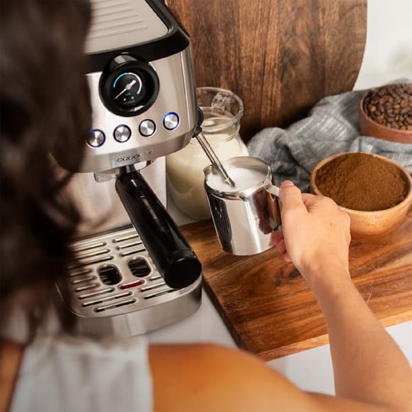 Cecotec 20-bar espresso coffee machine with thermoblock, pressure gauge and steam tube.
