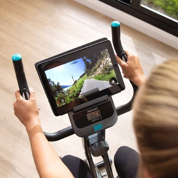 Cecotec Folding stationary bicycle. LCD display. Adjustable magnetic resistance. Comfort seat with side grips. Tablet holder and transport casters.