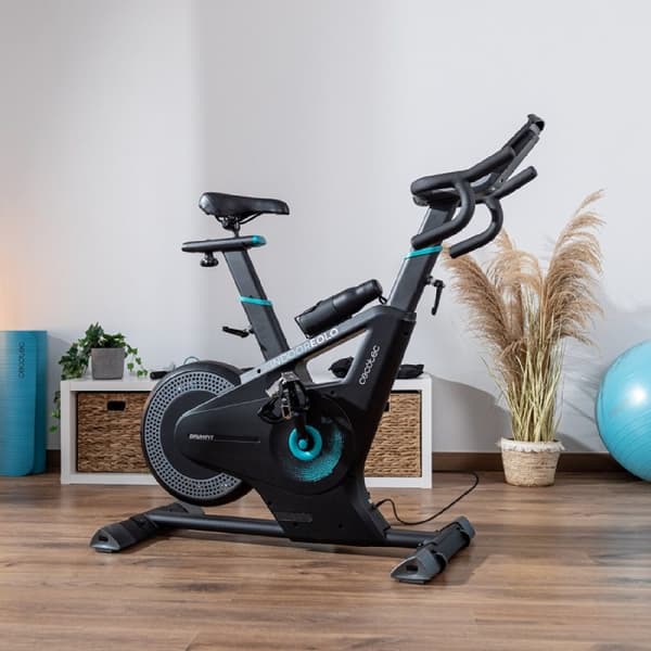 Cecotec Indoor bike with combined resistance: air and magnetic. APP. Device and bottle holder. Chest strap heart rate monitor. LCD touch display. Spo