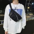 Miniatyrbillede 4 af 4: INF Sort brysttaske - Stilfuld og funktionel crossbody-taske