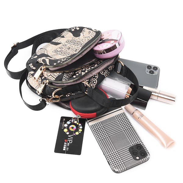 INF Crossbody-taske i kanvas med elefantprint