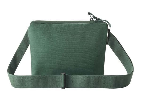 Eagle Creek Sac banan grön mörk för dam och herr - Stash RFID Sling Bag Gräsgrön 299008