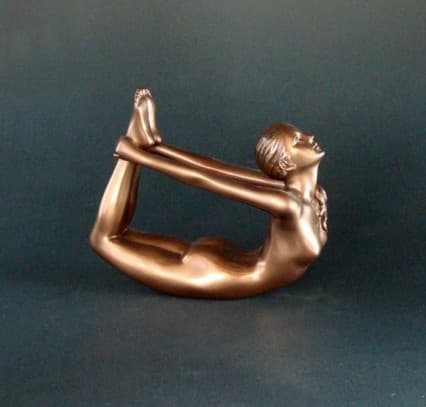 Yoga lady statue: Dhanurasana (bow pose)