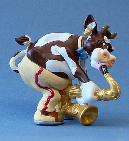 Figurine: Cow saxplayer 'So'Vache' 11 cm