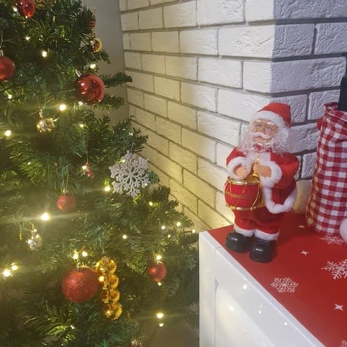 Dansande Jultomte - Dansar och sjunger