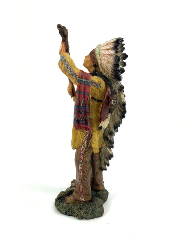 Native american with wooden stick
