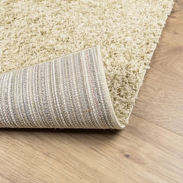 Ryamatta PAMPLONA lång lugg modern guld 80x150 cm