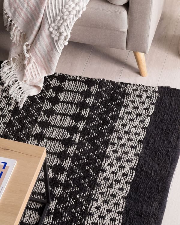 Lædertæppe 140 x 200 cm sort med beige SOKUN Lumarko!