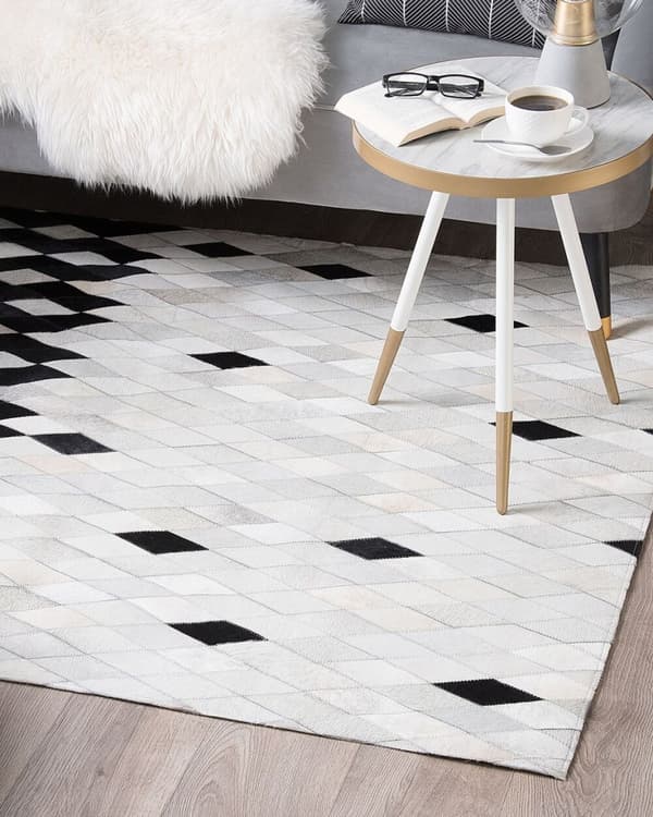 Patchwork lædertæppe 160 x 230 cm sort og hvid MALDAN Lumarko!