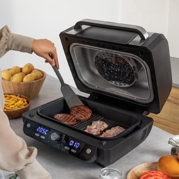 Cecotec Air grill fryer with 1700 W, double heating element, 12 cooking modes and 4 grill levels.
