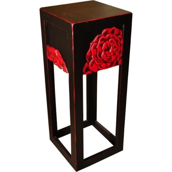 Stor sort blomsterstand med en rose