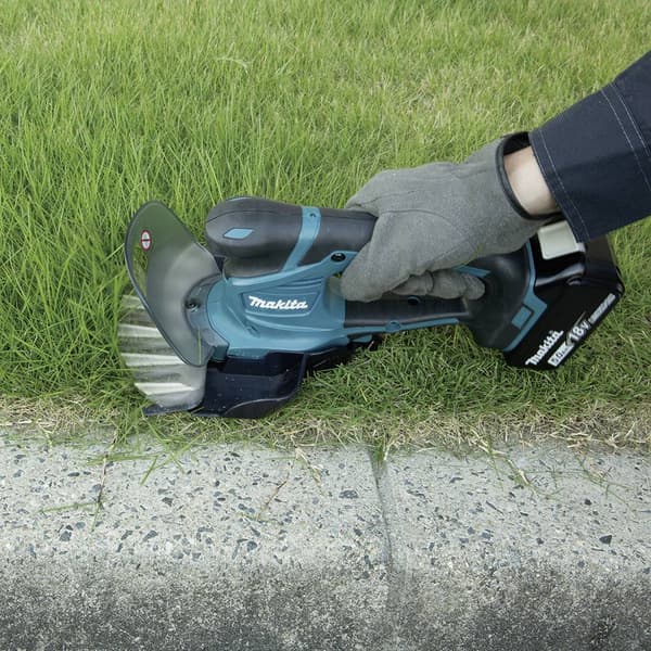 Makita DUM604RFX1 Grässax Batteri inkl. batteri, inklusive laddningsstation 18 V Li-Ion