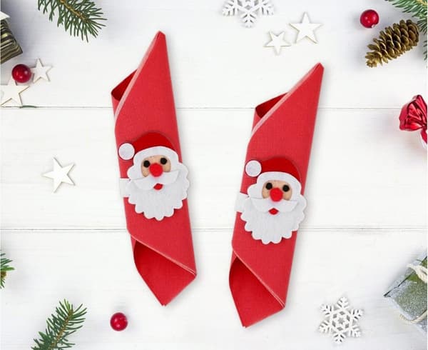 Julklingande servettringar med jultomte-set