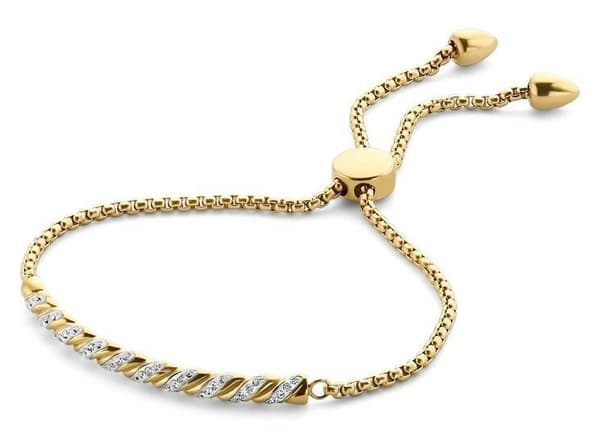 Victoria armband i guld med vita stenar