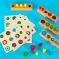 Pikkukuva 9 / 9: Montessori träcylindervikter färgglada