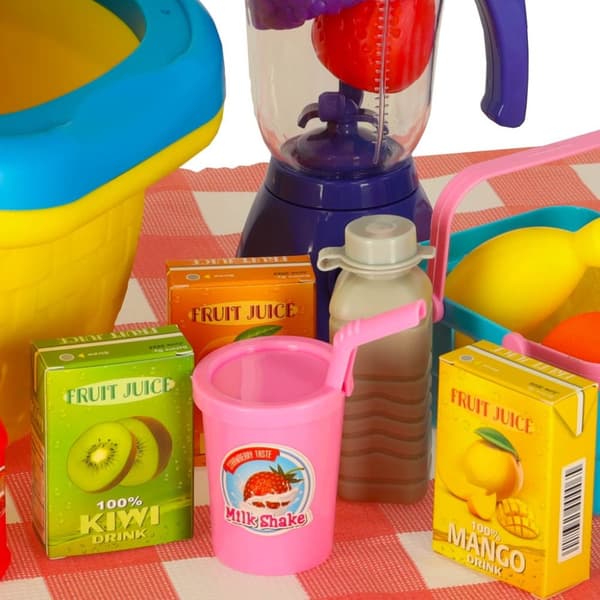 Picknickkorg fruktjuicer drycker mat leksaker