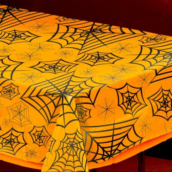 Halloween -oranssi pöytäliina hämähäkinverkomuovilla
