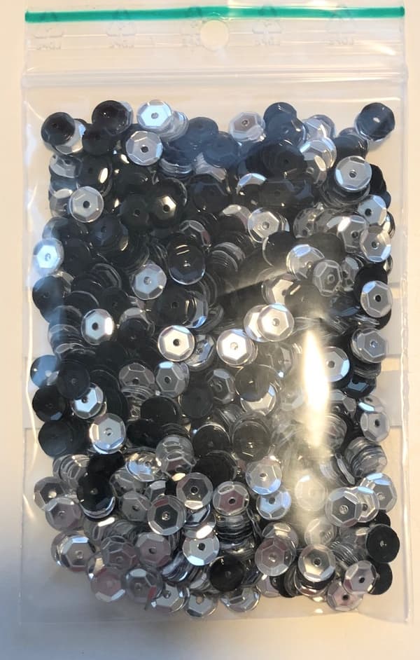 7 mm svart och silver runda paljetter