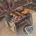 Miniatyrbillede 3 af 8: Lollanda foldbar campinggrill i rustfrit stål – bærbar kulgrill til camping, picnic og udendørs madlavning