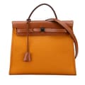 Miniatyrbild 1 av 10: Pre-owned Hermès Toile Herbag Zip 31 Orange