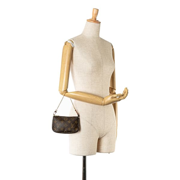 Pre-owned Louis Vuitton Monogram Mini Pochette Accessoires Brown