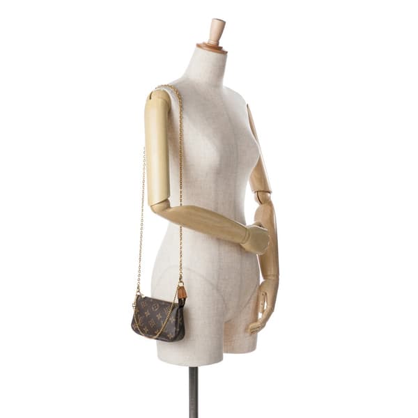 Pre-owned Louis Vuitton Monogram Mini Pochette Accessoires Brown