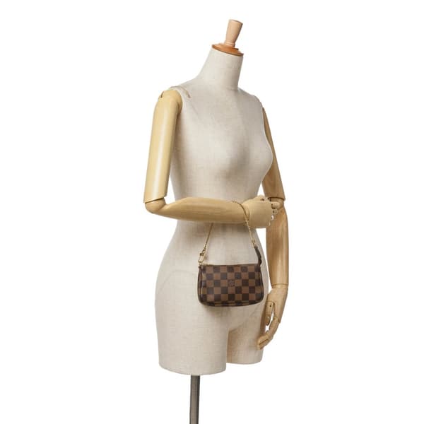 Pre-owned Louis Vuitton Damier Ebene Mini Pochette Accessoires Brown