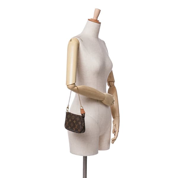 Pre-owned Louis Vuitton Monogram Mini Pochette Accessoires Brown