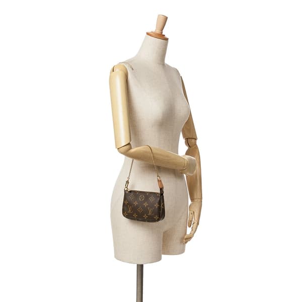 Pre-owned Louis Vuitton Monogram Mini Pochette Accessoires Brown