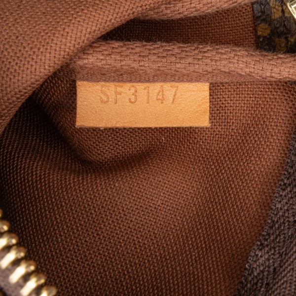 Pre-owned Louis Vuitton Monogram Giraffe Christmas Mini Pochette Accessoires Brown