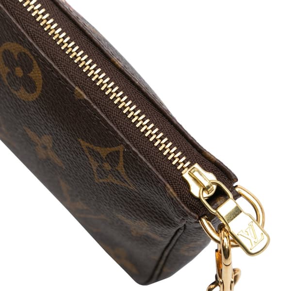 Pre-owned Louis Vuitton Monogram Giraffe Christmas Mini Pochette Accessoires Brown